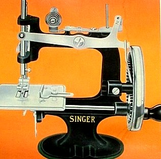 Antigua mini máquina de coser Singer Sewhandy modelo 20-10.